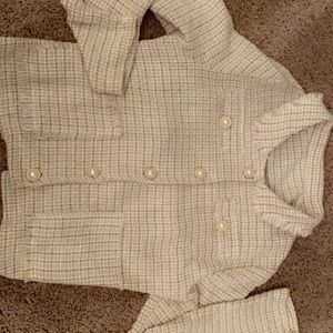 Cute button up jacket. Washed but Never worn Pairs well with tank, jeans & heels